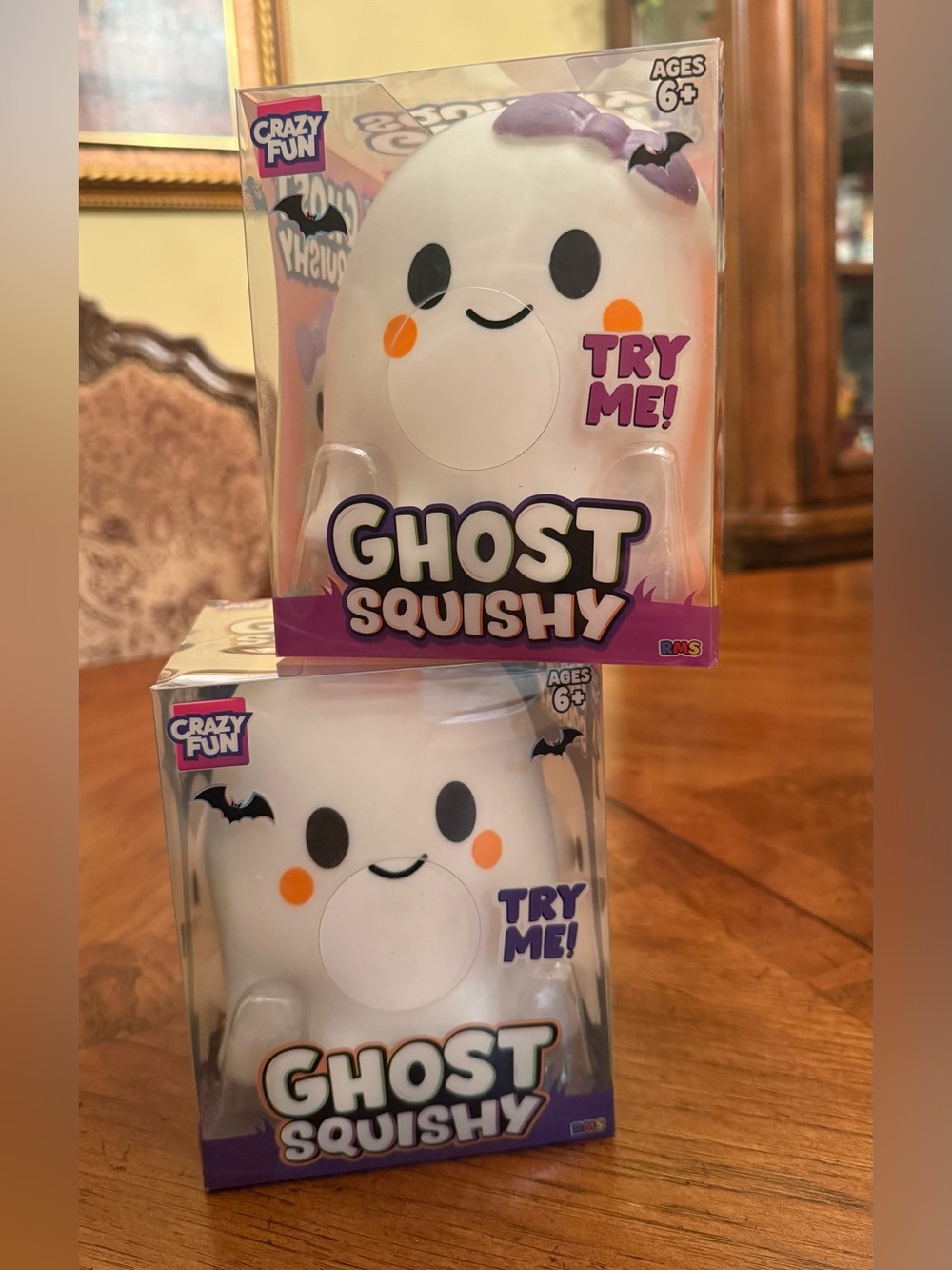Crazy Fun Ghost Squishy’s,  White with Purple and Orange Accents